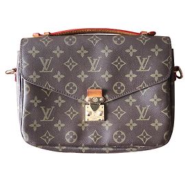 Louis Vuitton Métis Monogramm Marrón oscuro