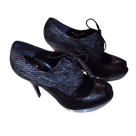 Stuart Weitzman Black Leather Serpent Print Pumps Black
