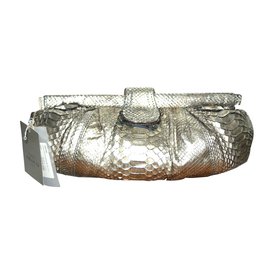 Abaco Clutch bags Golden