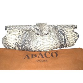 Abaco Clutch bags Python print