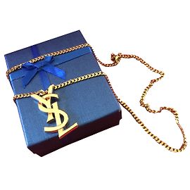 Yves Saint Laurent Collane con ciondoli D'oro