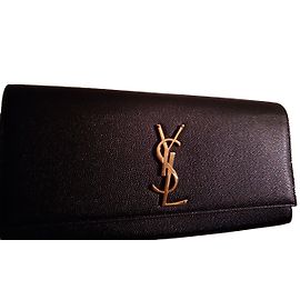 Pochette Yves Saint Laurent Monogram Classic in pelle nera Nero D'oro