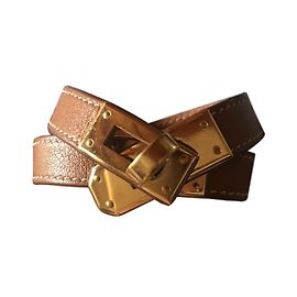 Hermès Turnê duplo com pulseira Kelly Caramelo