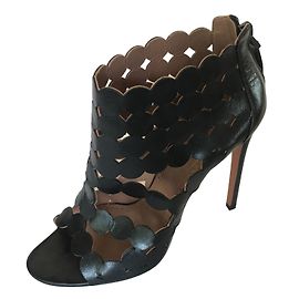 Décolleté Alaïa in pelle nera Nero