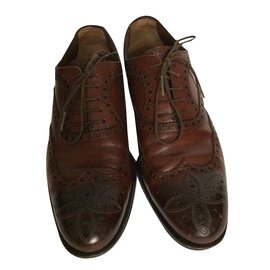 Louis Vuitton lacci alari Marrone
