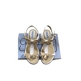 Autre Marque Sandali per bambini in pelle bianca e oro Bianco