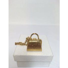 Christian Dior-Saco de jóias-Dourado