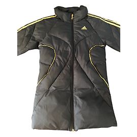 Adidas Blousons, manteaux filles Noir Doré