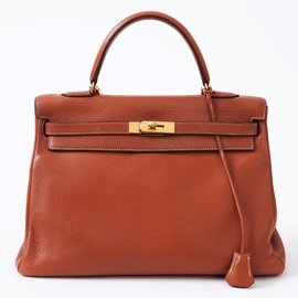 Hermès-Hermès Kelly bag 35 Camel leather shoulder strap Taurillon Clémence in very good condition!-Golden