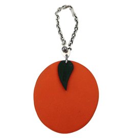 Hermès-Hermès charm motivo fruta naranja en cuero x cadena de metal encanto de bolsa-Naranja