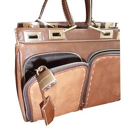Sac à main Lancel en cuir et daim marron Marron