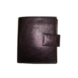 Carteira Yves Saint Laurent em couro preto Preto
