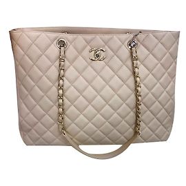 Bolsa de compras clássica da Chanel Bege