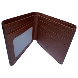 Louis Vuitton-Classic monogram wallet. Chic and useful gift-Brown