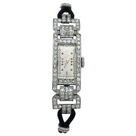 inconnue Relógio Art Deco em ouro e ouro branco com cordão, diamantes. Outro