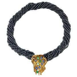 Collier Roland Schad en or jaune, hématites et pierres de couleur. Autre