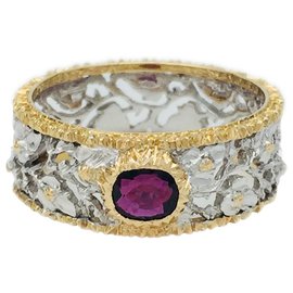 Buccellati ring in yellow and white gold, ruby. Other
