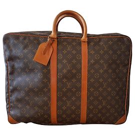 Louis Vuitton Sírius 55 Marrom
