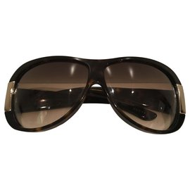 Gucci-Des lunettes de soleil-Marron