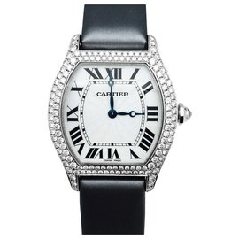 Cartier-Cartier watch, model "Turtle", in white gold and diamonds on satin.-Other