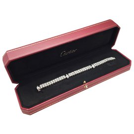 Cartier-Bracelet lignes Cartier, modèle "Calypso"en platine et diamants.-Autre