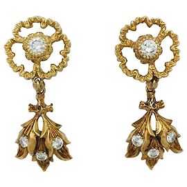 Orecchini Buccellati in oro giallo e diamanti. Altro