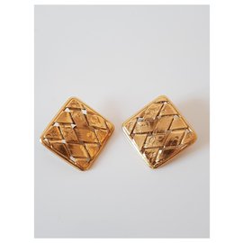 Yves Saint Laurent-Brincos de metal dourado vintage Yves Saint Laurent-Dourado