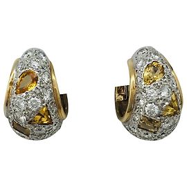 Pomellato dos pendientes de oro., zafiros amarillos y diamantes. Otro