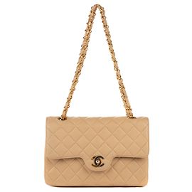 Excelente Chanel 23 cordeiro acolchoado bege em muito bom estado! Bege