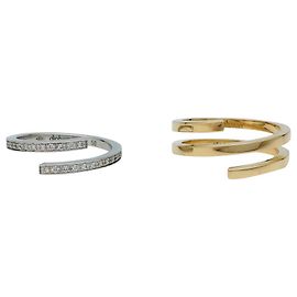 Dinh Van ring "Spiral" model in yellow gold, white and diamonds. Other