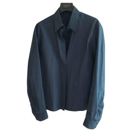 Alaïa-Blusa de algodón azul marino con mangas de volumen.-Azul