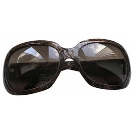 Chanel-Des lunettes de soleil-Marron