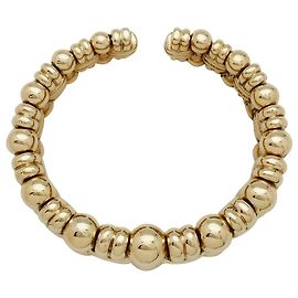 Bracciale modello Boucheron "Cross balls" in oro giallo. Altro