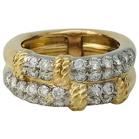 Bague Fred "Isaure", 2 tons d'or, diamants. Autre