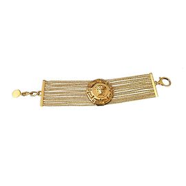 Fabuleux bracelet manchette versace médusa Doré