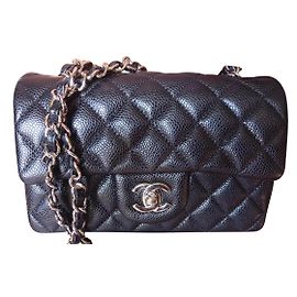 Chanel Classic Mini Bolsa intemporal em caviar de couro de novilho Preto