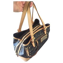 Louis Vuitton remachar Castaño