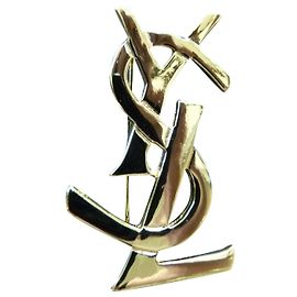 Yves Saint Laurent Alfileres y broches Dorado