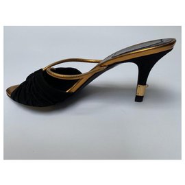 Christian Dior-Chinelas de tacón de aguja negras y doradas-Negro,Dorado