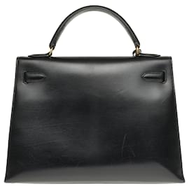 Hermès-Hermes Kelly 32 correa de hombro de cuero de caja negra, Ribete de metal chapado en oro en excelentes condiciones.-Negro