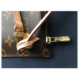 Louis Vuitton-bolsillos-Castaño