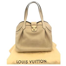 Bolso Louis Vuitton Cirrus de piel de pitón beige Beige