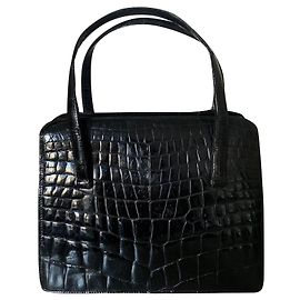 La borsa vintage è in pelle di coccodrillo, anni 1950-1960 Nero