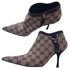 Botas Gucci GG Monogram de couro marrom bege Marrom Bege Castanha