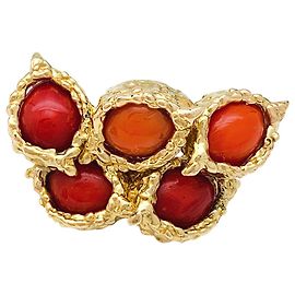 Orecchini Chaumet in oro giallo e corallo. Altro