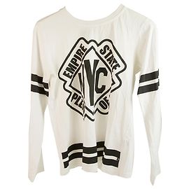 Philipp Plein Junior White mit schwarzem Baumwoll-Longsleeve für Jungen oder Mädchen Schwarz Weiß