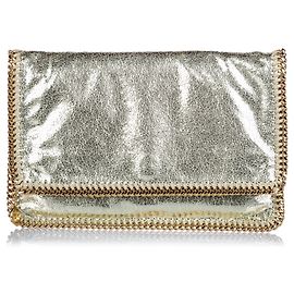 Stella Mc Cartney Stella McCartney Clutch dorado con falabella de ciervo lanudo Dorado