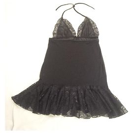 Autre Marque Camisole en dentelle raffinée. Semi-diaphane. never worn. Noir