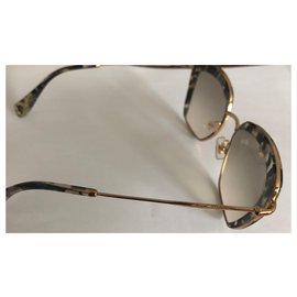 Miu Miu-Des lunettes de soleil-Marron clair