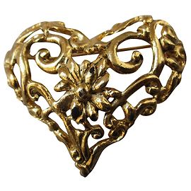 Christian Lacroix Spilla a cuore barocco. D'oro